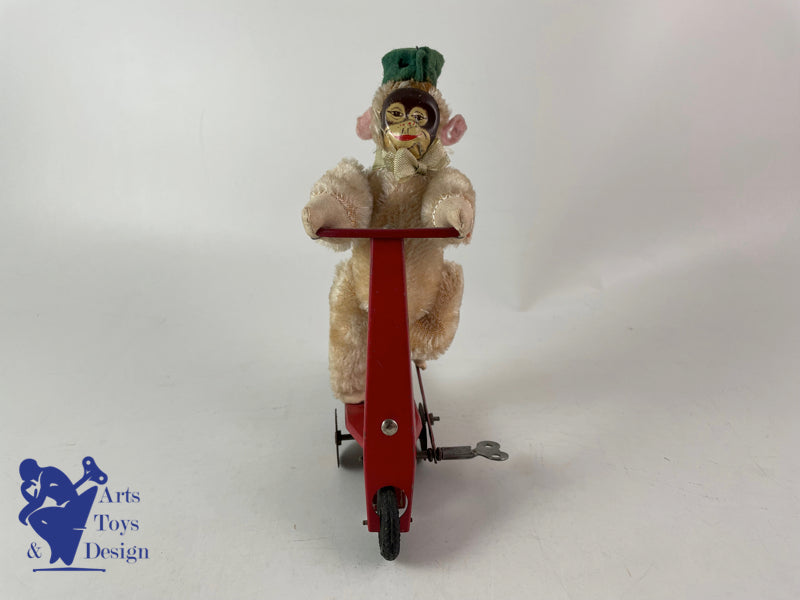 Antique toys SFA France Monkey on scooter Clockwork Circa 1950 h 16cm