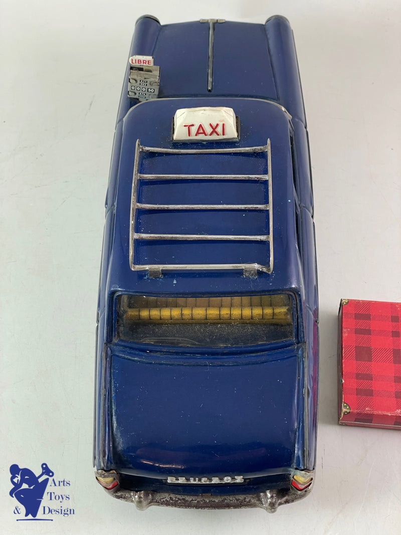 Antique toys Joustra 2083 Peugeot 404 Taxi Electric Roof Rack 30cm circa 1960