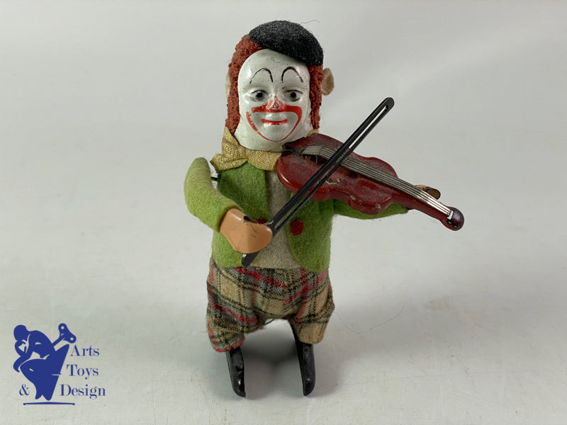 JOUET SCHUCO ALLEMAGNE CLOWN SOLISTO AU VIOLON C.1950