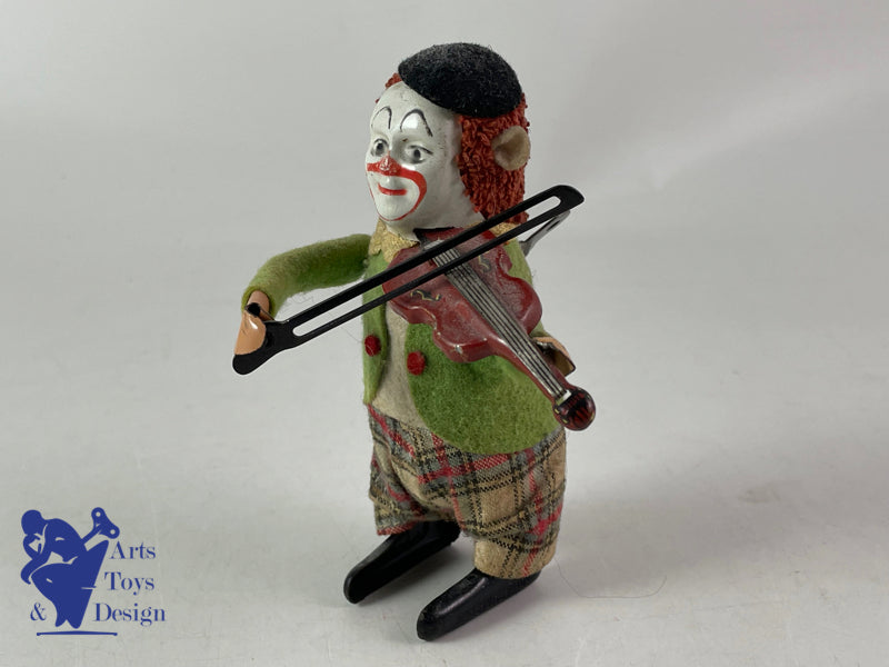 JOUET SCHUCO ALLEMAGNE CLOWN SOLISTO AU VIOLON C.1950